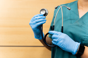 Doctor holding a stethoscope for patient examination