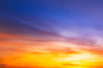 Colorful clouds and sky,Dusk, Sunset Sky Clouds in the Evening with colorful Orange, Yellow, Pink and red sunlight and Dramatic storm clouds on Twilight sky