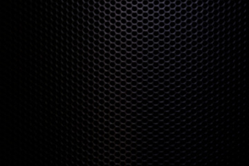 Black macro speaker surface,Fragment of the speaker with a metal perforated grille. Great...