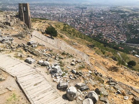 Bergama, Turkey - May 18, 2024: above view of modern Turkish Bergama city from wall of ancient Greek town Pergamum on sunny spring day. Pergamum ruins is in UNESCO World Heritage Site