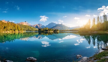 Lake and mountains. Clear Lake with Reflection of Blue Sky.