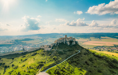 Fototapeta premium Aerial view of the Spiš Castle near Spisska Kapitula Slovakia, Tatra Mountains on the horizon