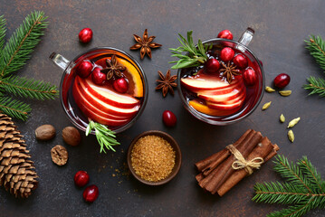 Delicious mulled wine with ingredients for making. Top view with copy space.