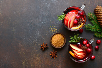 Delicious mulled wine with ingredients for making. Top view with copy space.