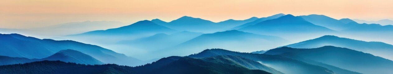 Obraz premium Serene mountain landscape at dawn with soft, misty blue hues