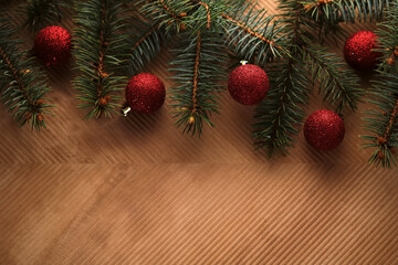 Abstract Christmas and New Year's background with Christmas tree and red Christmas balls.