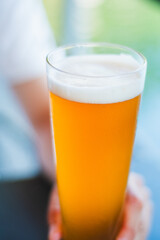 Glass of beer with foam