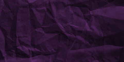 Purple crumpled paper texture in low light background. Silk cloth texture. Fabric pattern. crumpled kraft paper. A crumpled sheet of dark pink and purple paper abstract background. old paper texture. 