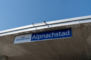Obraz premium Sign for the ferry boat pier dock stop at Alpnachstad Switzerland. This stop is used by tourists taking the Golden Round Trip to Mt Pilatus