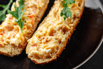 smorrebrod salad spread surimi and crab sticks, mayonnaise fresh meal food snack on the table copy space food background rustic top view