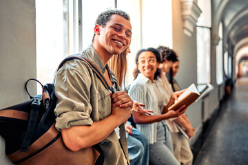 Portrait of happiness african american boy at university. Male student, smile and notes for knowledge at college, academy scholarship for school.