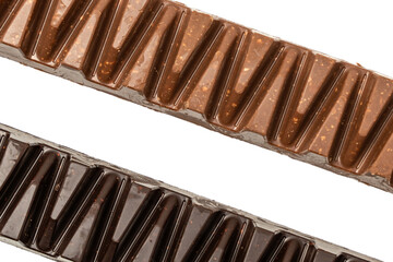 Two chocolate bars with different shapes and sizes. One is brown and the other is white. The brown one is more curved and has a more rounded shape, while the white one is more rectangular