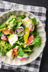 salad fig fresh green lettuce, figs, soft cheese meal food snack on the table copy space food background rustic top view vegetarian vegan food