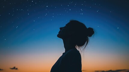Silhouette of a Woman Gazing at the Stars
