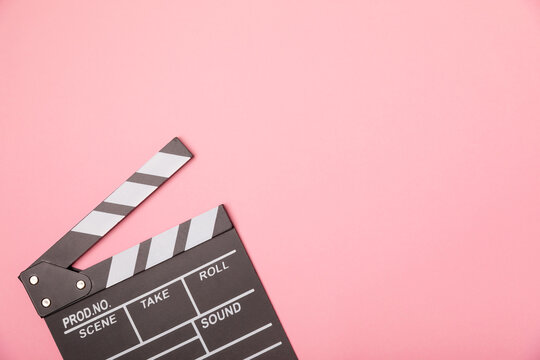 Movie clapper. Movie clapperboard on a bright colored background. Concept of rest and entertainment. Concept of cinema. Film director. Producer. Business and profession. Place for text. Copy space