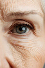 Close up Elderly woman eye wrinkles. Cosmetology concept. 