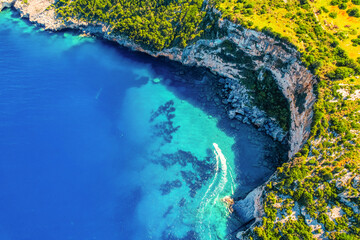 Blue caves on Zakynthos island or Zante Island, Greece. Beautiful views of azure sea water and nature with cliffs cave. Boat trip