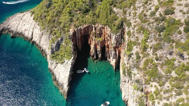 Red Rocks, Hvar, Croatia - Close-Up Aerial Of The Coastal Cliffs, Croatia. Detailed Drone Footage Of The Red Rocks On Hvar Island, Capturing The Dramatic Cliff Faces And Surrounding Azure Waters.