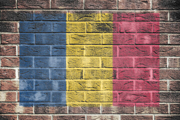Chad flag on brick wall background