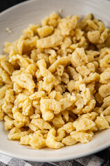 egg pasta spaetzle shape fresh meal food snack on the table copy space food background rustic top view