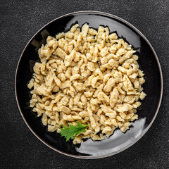 egg pasta spaetzle shape fresh meal food snack on the table copy space food background rustic top view