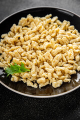 egg pasta spaetzle shape fresh meal food snack on the table copy space food background rustic top view
