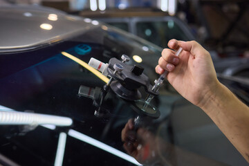Installing windshield on a car with automotive design