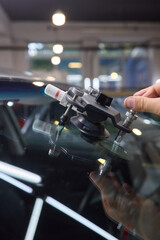 Installing windshield on a car with automotive design