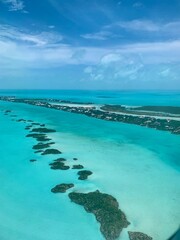 Turks and Caicos beaches feature soft, white sand blending seamlessly into crystal-clear turquoise...