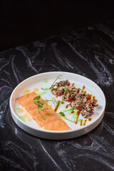 Delicately and Artfully Plated Sushi Featuring Fresh Salmon and Delicious Tuna Slices