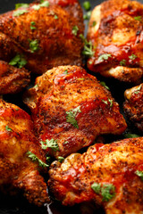 Chicken Thighs topped with buffalo sauce.