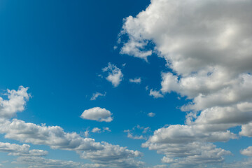 sky is blue with a few clouds scattered throughout