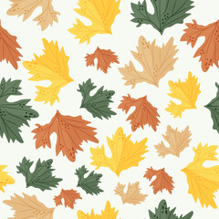 seamless pattern of autumn leaves namely multicolored maple leaves in pastel colors placed randomly, vector