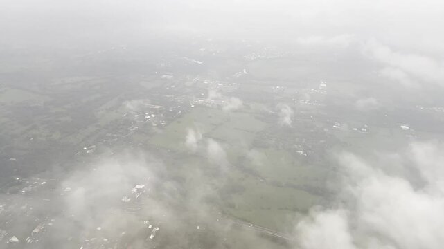 View from an airplane descending over central Costa Rica on approach to San Jose International Airport.