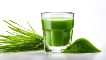 An isolated image of a wheatgrass shot in a small glass on a white background