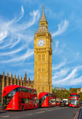 Obraz premium Houses of Parliament with Big Ben and double-decker buses on Westminster bridge, London, UK