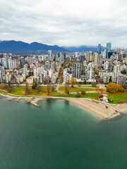 Obraz premium Top cinematic aerial view. Downtown Vancouver British Columbia. Aerial View Of Skyline Buildings.