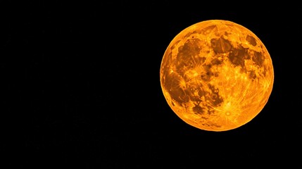 Fototapeta premium A plane flying in front of the full moon in a dark night sky