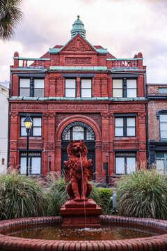 Savannah, Georgia, USA. Griffin lion water fountain at the Savannah Cotton Exchange building