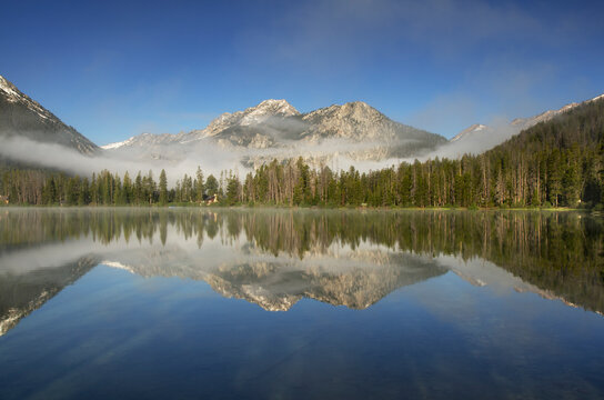 USA, Idaho. Petit Lake in clearing morning fog, Sawtooth National Recreation Area.