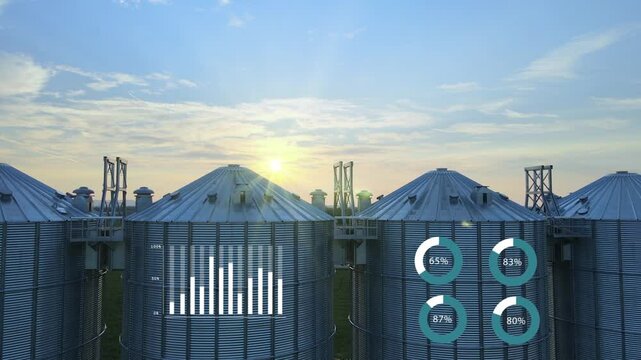 Aerial inspection of Agricultural silos for grain storage at sunset, animation infographics showing global market statistics of food prices and production efficiency in modern smart precise farming