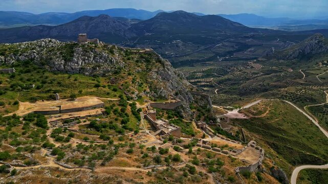 Medieval Acrocorinth Castle and Temple to Aphrodite atop mountain, aerial view