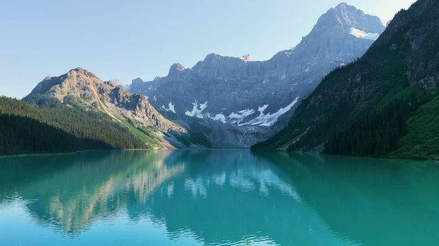 Rocky Mountains, Canada. Top cinematic aerial view. Chephren Lake, Jasper National Park, Alberta. 4K drone footage. Canadian wild nature and landscape from above