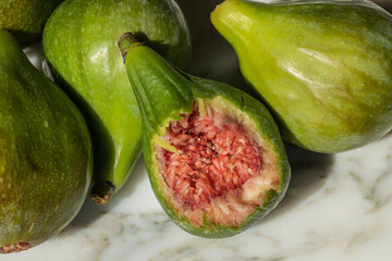 bite taken out of green fig fruit