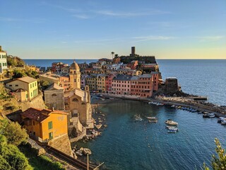 Picturesque view of Cinque Terre, Italy, with colorful houses perched along the coastline.