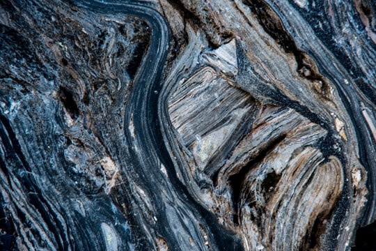 USA, Oregon. Patterns of obsidian flowing around pumice.