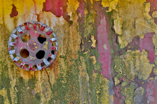 USA, Oregon, Tillamook. Old rusted vehicle close-ups with peeling paint on valve of old firetruck