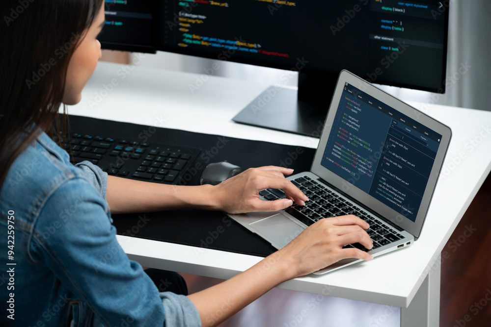 Poster smiling young asian in it developer creating with typing online information on laptop with coding pr