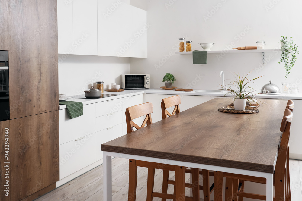 Sticker interior of modern stylish kitchen with dining table