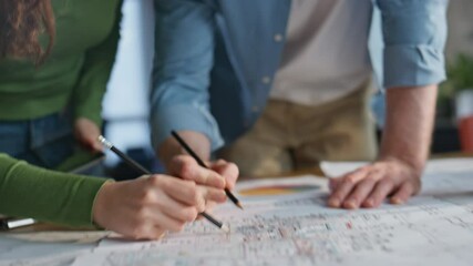 Closeup architects hands drawing blueprint planning construction project office